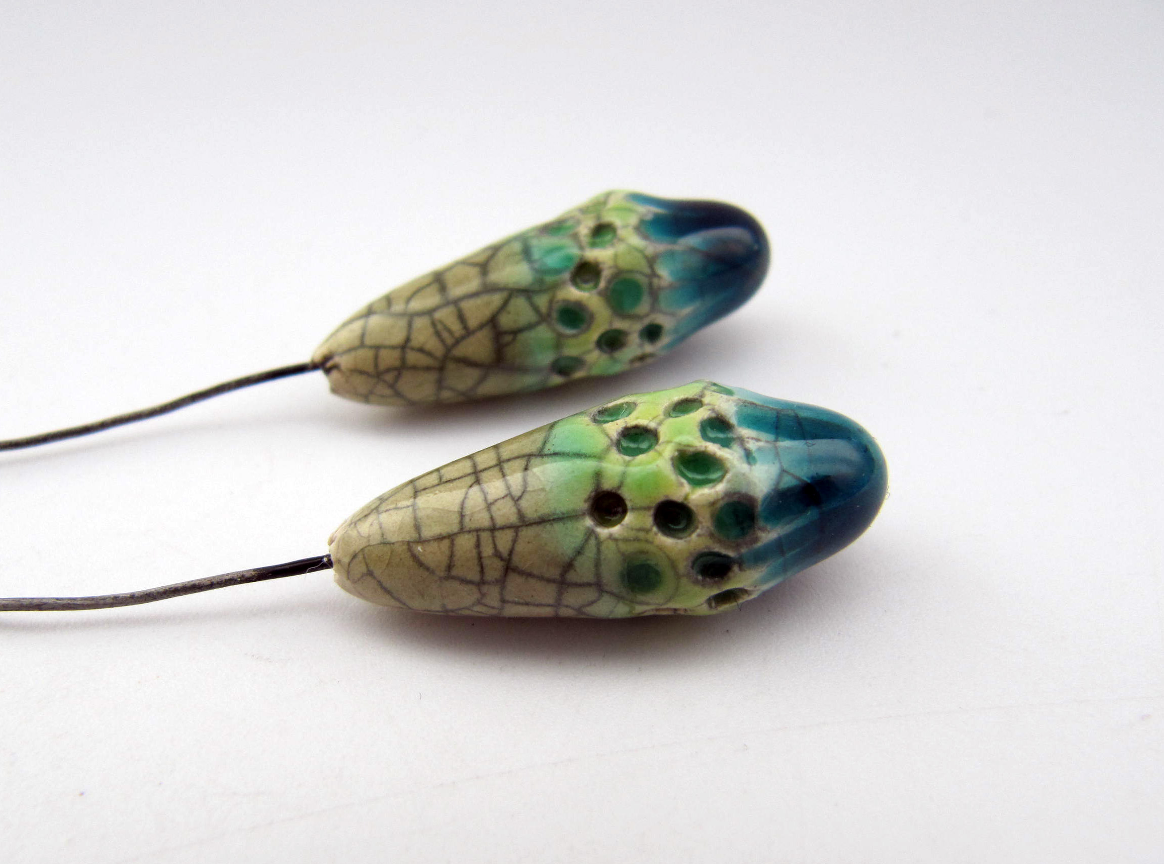 green blue textured pod pins